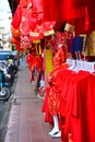 Lamps and red garments for use during Chinese New Year.