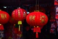 Lamps and red garments for use during Chinese New Year.