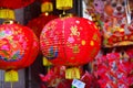 Lamps and red garments for use during Chinese New Year.