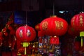 Lamps and red garments for use during Chinese New Year.