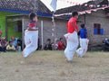 Childrens competiting in sack race. Celebration to welcome Independence day of Indonesia Royalty Free Stock Photo