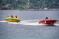 Group of Asian people wearing life jacket in extreme water sport activity at Tangkil island beach resort