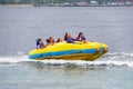 Group of young Asian people wearing life jacket in extreme water sport activity