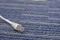 LAN cable or Ethernet cable rj45 plugins on carpet Royalty Free Stock Photo