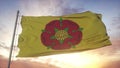 Lancashire flag, England, waving in the wind, sky and sun background