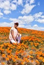 Lancaster, Ca / April 12, 2019 - Admiring the golden poppies in full bloom covering the hillsides in the Antelope Valley with brig