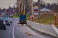 LANCASTER, USA - APRIL, 18, 2018: Outdoor view of the back of old fashioned Amish buggy with a horse riding on urban