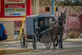 LANCASTER, USA - APRIL, 18, 2018: View of amish carriage along the city, known for simple living with touch of nature