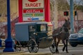 LANCASTER, USA - APRIL, 18, 2018: View of amish carriage along the city, known for simple living with touch of nature