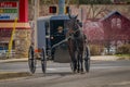 LANCASTER, USA - APRIL, 18, 2018: View of amish carriage in the city, known for simple living with touch of nature