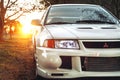 Front view of a white Mitsubishi Evolution VI