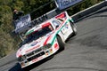 A Lancia Rally 037 racing car during a timed speed trial in the second edition of the Ronda Di Albenga race that takes place ever