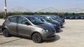 Lancia Ypsilon cars in a row outside the official dealer of the italian automaker