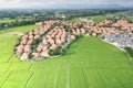 Land and housing estate in aerial view.