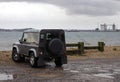 Land Rover by bay Royalty Free Stock Photo