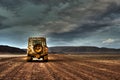 Land Rover Defender on Deserted Road at dusk