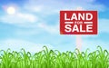 Land sale sign on grass field with sky background Royalty Free Stock Photo