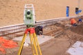 Land surveyors working construction site