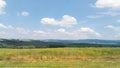 Landcscape hight mountains. Landscape in the fields. Beautiful blue sky with cloud Royalty Free Stock Photo