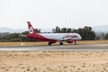 Landed airplane on Faro International Airport, Portugal Royalty Free Stock Photo