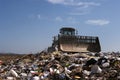 Landfill moving trash Royalty Free Stock Photo