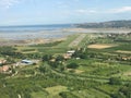 Landing aircraft on paved runway Royalty Free Stock Photo