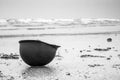 Landing beaches of june 6, 1944 in Normandy. Utah beach. Helmet of a parachutist on the sand. The longest day. Royalty Free Stock Photo