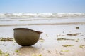 Landing beaches of june 6, 1944 in Normandy. Utah beach. Helmet of a parachutist on the sand. The longest day.