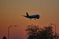 Commercial Jet on approach for Landing at Dusk Royalty Free Stock Photo