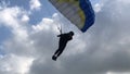 Landing. Parachutist lands on the ground. The whole world is open to extremals. The sky without borders. Royalty Free Stock Photo