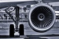 The landing gear and turbofan engine of passenger airliner. Royalty Free Stock Photo