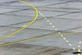 Landing light Directional sign markings on the tarmac of runway at a commercial airport. Royalty Free Stock Photo