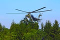 Landing a military helicopter Royalty Free Stock Photo