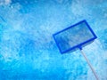 Landing net or fishing net with pool Royalty Free Stock Photo