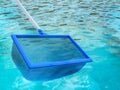 Landing net or fishing net with pool Royalty Free Stock Photo