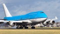 A Boeing 747 Jumbo jet touching down Royalty Free Stock Photo