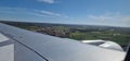 landing of a plane look from the passenger window Royalty Free Stock Photo