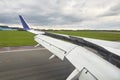 Landing plane wing flaps and spoilers extended Royalty Free Stock Photo