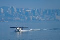 Landing sea plane in the downtown Vancouver Royalty Free Stock Photo