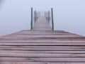 Landing stage in the fog Royalty Free Stock Photo