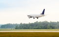 Landing or taking off passenger airplane Royalty Free Stock Photo