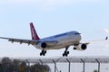 Landing TC-JOU Turkish Airlines Airbus A330-200F aircraft in sunset rays