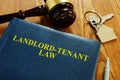 Landlord Tenant Law book and key Royalty Free Stock Photo