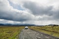 LANDMANNALAUGAR, ICELAND - AUGUST 2018: Car driving on the rough terrain towards Landmannalaugar national park