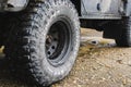 LANDMANNALAUGAR, ICELAND - AUGUST 2018: close-up of car all-terrain tires on the mud road Royalty Free Stock Photo