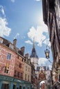 landmark clock tower and storefronts in auxerre Royalty Free Stock Photo