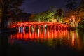 Landmark of Hanoi - The Huc Bridge and Hoan Kiem Lake in the night at Hanoi, Vietnam