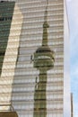 Landmark tower mirrored on Toronto building glass Royalty Free Stock Photo