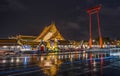 Landmark Wat Suthat Buddhist Temple and giant red swing