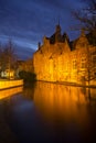 Landmarks from Bruges (Brugge) - Belgium - beautiful old house reflected canal waters by night Royalty Free Stock Photo